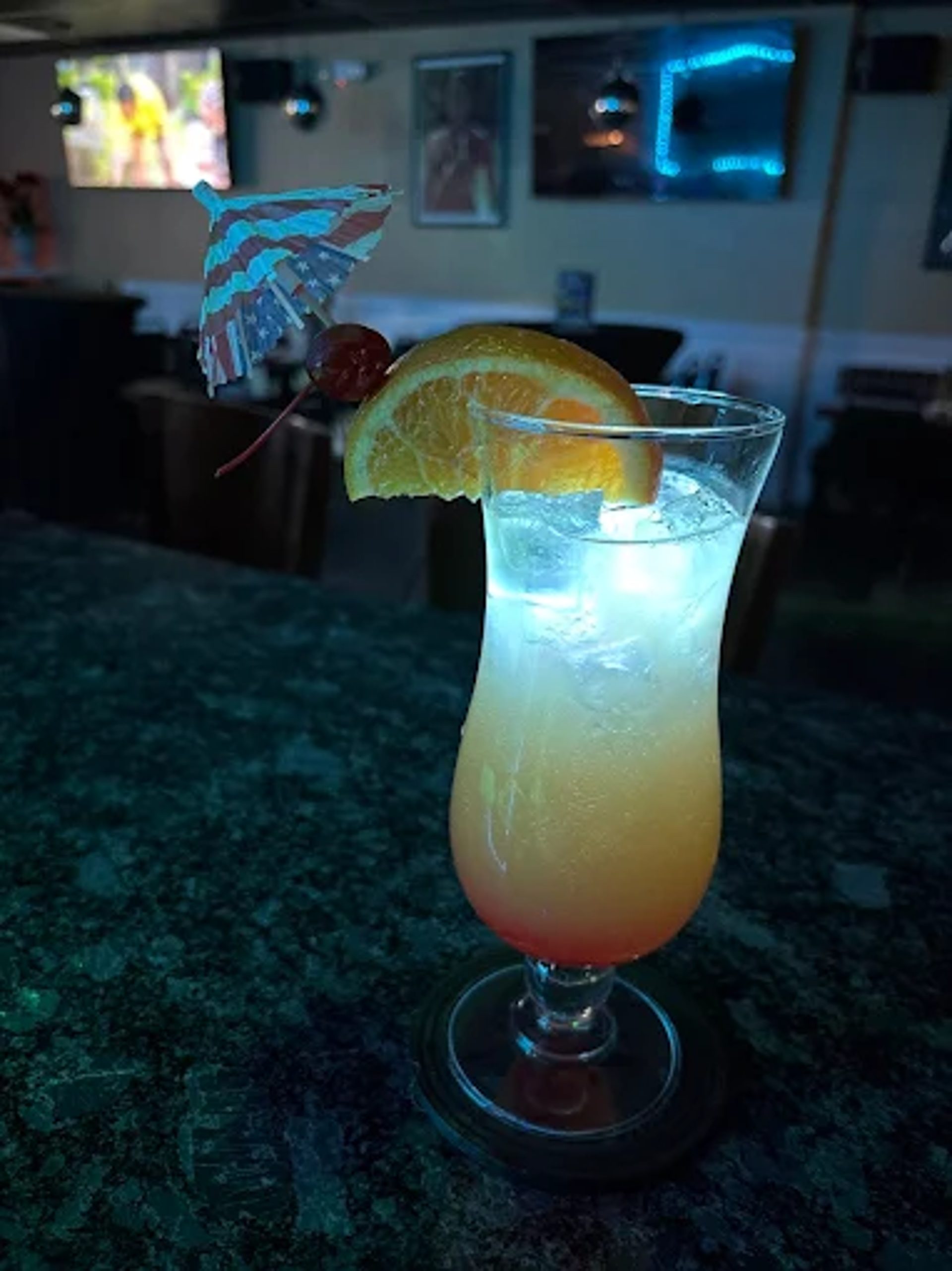 Signature cocktails, cold beers, good vibes at Sun Island Bar-BQ & Jerk